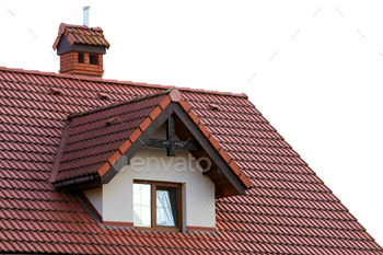 Shut up of latest orange roof with chimney and small stylish window. Thought of standard roof with