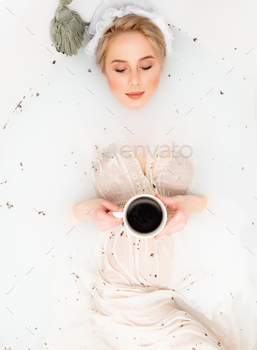 Lady in basic apparel take a bath with lavender