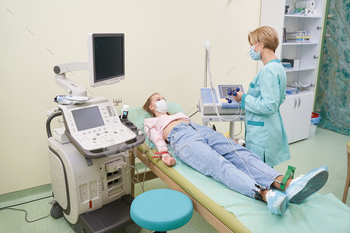 Attentive female individual paying consideration to her doctor