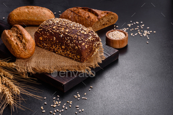 New Bread on black background, high glimpse, reproduction home