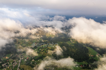 Aerial take into story of foggy break of day within the mountains. Carpathian mountains