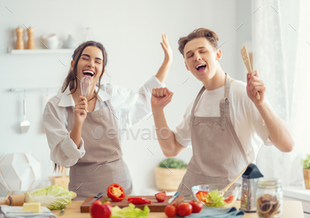 loving couple is making ready the upright meal