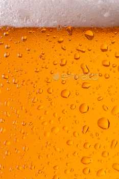 Part of glass of cool beer