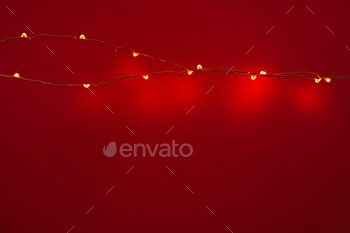 Summary Christmas lights garland on sunless background