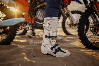 Bike trials sooner or later of motocross competition closeup rider boots