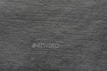 Artificial darkish grey, gloomy leather for background. Shut-up decoration cloth