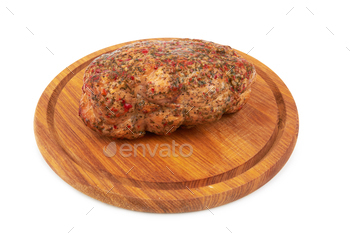 Baked meat on cutting board isolated on white background