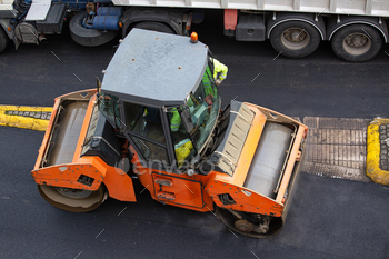 Asphalt roller at work