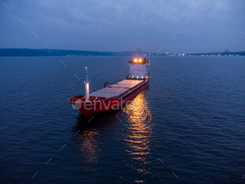 Expansive total cargo ship tanker bulk provider, aerial watch at evening.