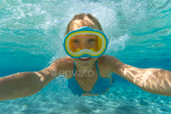 Underwater portrait of runt one in the ocean