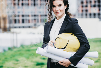 Architect girl with a map. An architectural thought