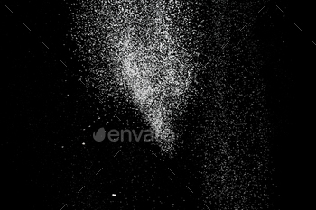 White powder explosion. White powder splash isolated on black background. Flour sifting