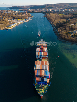 Aerial prime inspect container ship, shipping or transportation belief background.