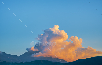 Sunset in the mountains, the clouds over the mountain