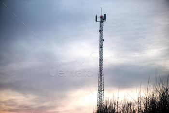 Signal tower or telecommunication tower with sky and cloud. Concept 5 G web