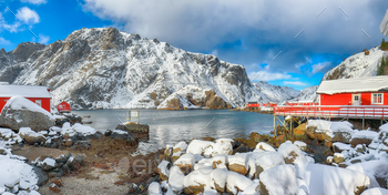 Horny morning seascape of Norwegian sea and cityscape of Nusfjord village.