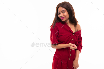 Portrait of expressive gorgeous African-American girl possing on background