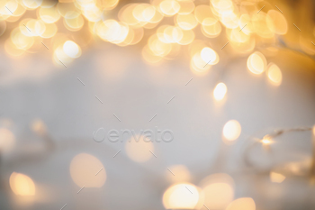 summary shiny gold background. blured bokeh vivid golden background for procure with copyspace