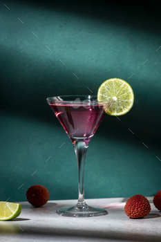 Alcoholic cocktail drink with vodka, gin, lychee, lime juice and ice,