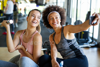 Glowing women determining in gym collectively to preserve healthy. Sport, folks, pal thought.