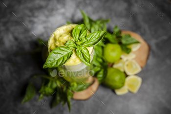 shut-up of a mint leaf ornament on a cocktail