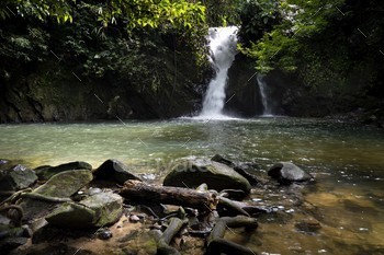 A most fascinating Sungai Ruok waterfall in peace nature atmosphere of 130 million years ancient Royal Belum