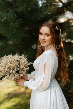 pink-haired lady bride with a wedding bouquet