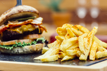 Veteran plate of chips and burger sandwich