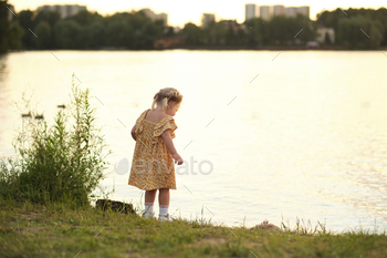 energy of standpoint and natural gentle in photography. A puny girl holds a bouquet of daisies, her