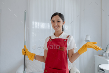 Asian lady cleaning the bottom with mop, housekeeper cleaning the firm office, inserting ahead cleanl