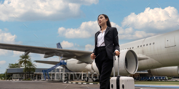 Vacationer trip theory. younger alternate woman keeping the baggage on the airport