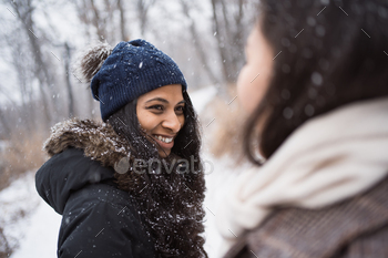 two ladies speaking oudtoors in winter park