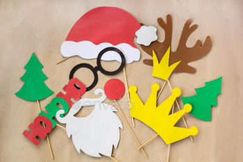 Photograph product sales utter vibrant props for christmas get together – mustache, santa claus, fir tree, glasses, crown