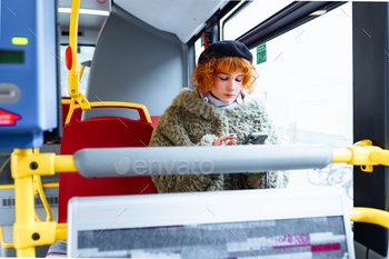 portrait younger woman on bus