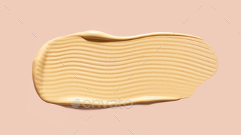 creamy beauty texture of golden good coloration beauty smear on beige background shut-up