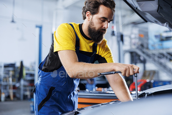 Storage employee replaces automobile radiator