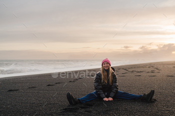 Youthful female vacationer taking part in take into fable of Icelandic landscapes and scramble places.