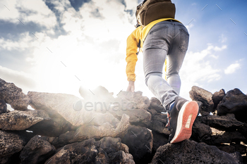 Hiker climbing mountains