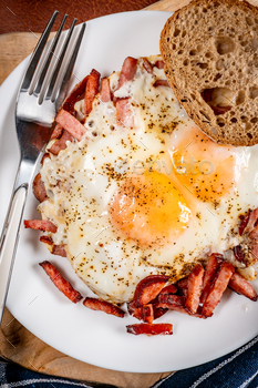 Fried egg and sliced sausage.