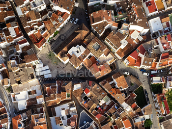 Overhead search of the zigzag streets and rooftops in Ojen, revealing the intricate construction of this