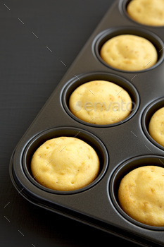 Handmade Cornbread Truffles on a darkish floor, low angle search for. Reproduction residence.