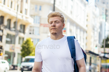 Younger albino latin man within the metropolis avenue