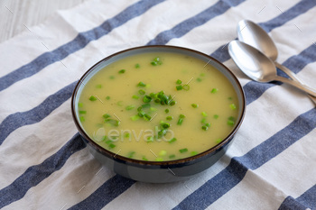 Hand-crafted Potato Leek Soup in a Bowl, facet glimpse.