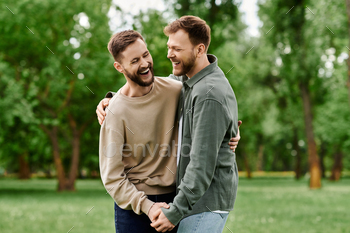 Bearded {couples} laughter inside the park