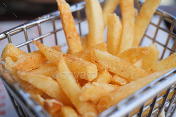 factor shot of French Fries on desk