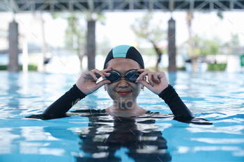 Female Carrying Swimsuit In Swimming Pool