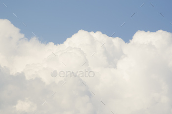 blue sky background with tiny clouds