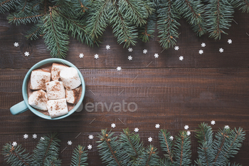 Christmas mug of espresso with marshmallow on darkish wooden board. Distinctive Yr. Excessive see and duplicate internet train.