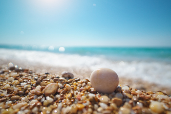 Sea stone on the seaside at day.