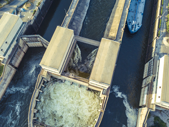 aerial drone shot of river gateway development for barge cargo ships f